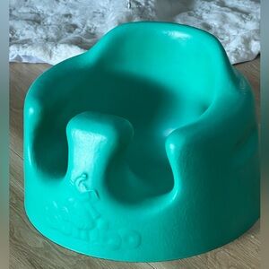 Turquoise Bumbo baby chair no straps GUC